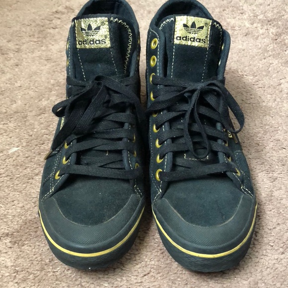 black and gold high top adidas